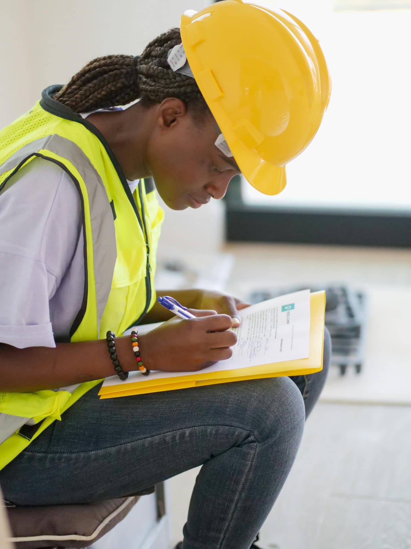 Worker inspecting industrial equipment